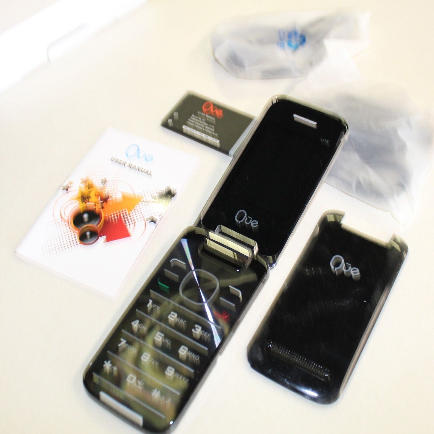 Rare Vintage Quest Lite QUE Phone International Black Collectible In Box
